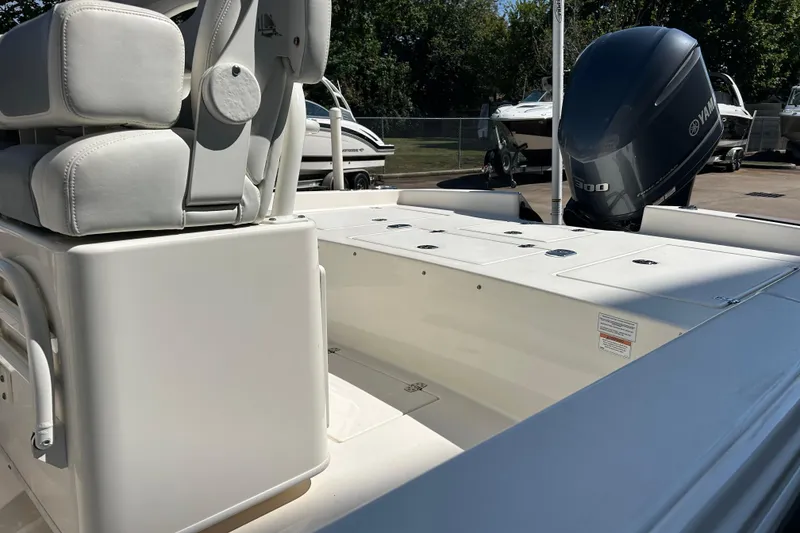 Slide: The Image of 2019 Pathfinder 2600 HPS boat with Yamaha 300 engine, featuring white seating and spacious deck. - 7
