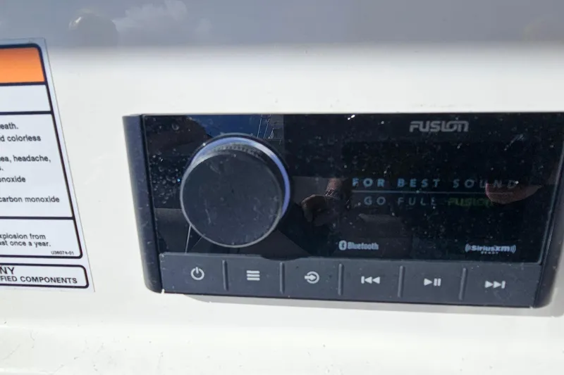 Slide: The Image of Fusion audio system on 2024 Sea Fox 268 Commander boat dashboard. - 22