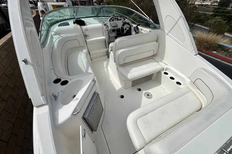 Slide: The Image of Interior of 2012 Bayliner 285 Cruiser with sink and mini fridge. - 13