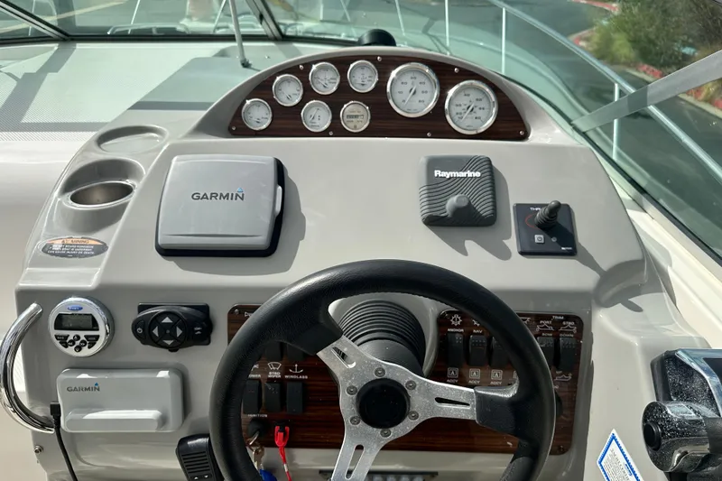 Slide: The Image of Control panel of 2012 Bayliner 285 Cruiser with Raymarine display and Vetus thruster joystick. - 19