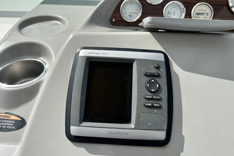 Slide: The Image of Control panel of 2012 Bayliner 285 Cruiser with Garmin and Jensen devices. - 20