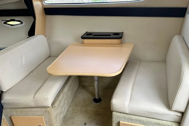 Slide: The Image of Electrical control panel on a 2012 Bayliner 285 Cruiser boat with safety warnings. - 30