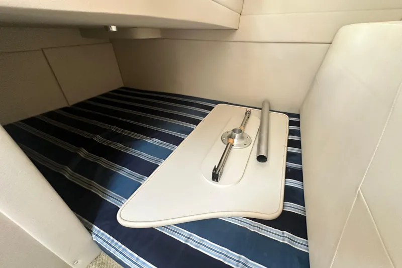 Slide: The Image of Battery compartment of 2012 Bayliner 285 Cruiser with wiring and connections. - 35