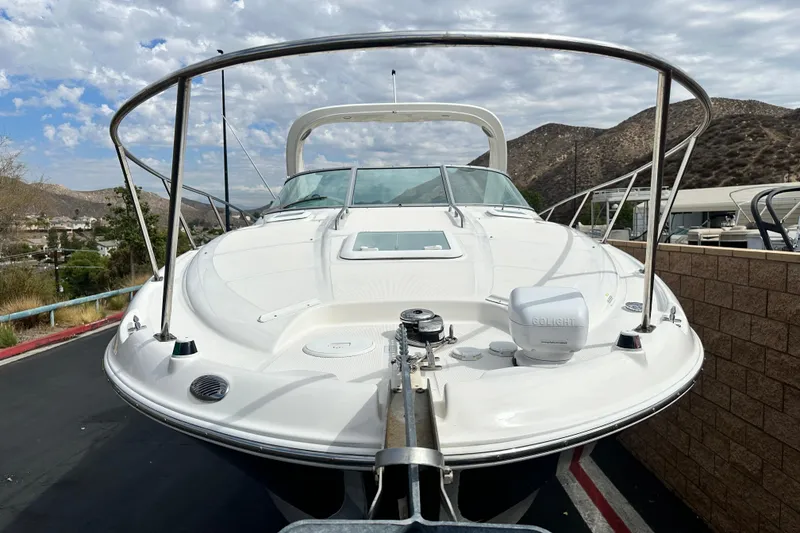 Slide: The Image of 2012 Bayliner 285 Cruiser bow with anchor and deck equipment. - 9