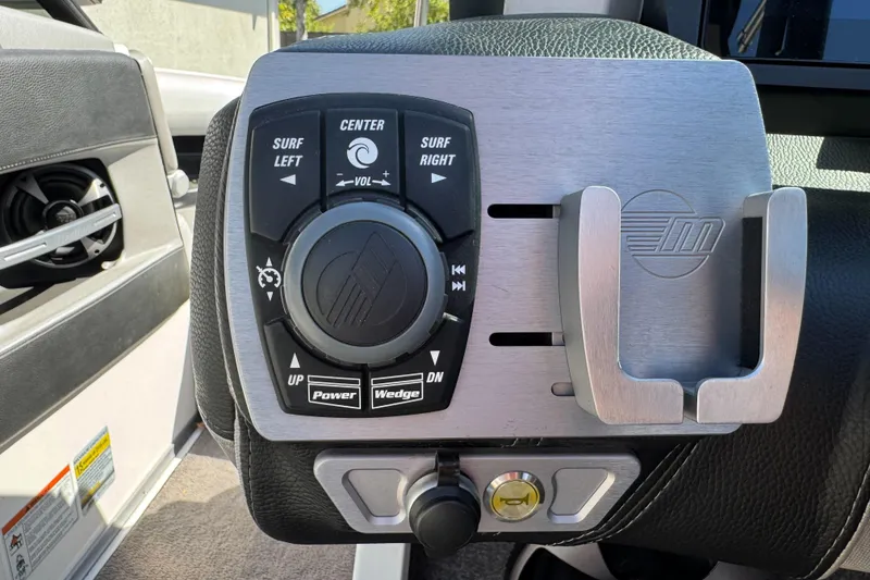 Slide: The Image of 2017 Malibu Wakesetter 23 LSV control panel with surf and power settings. - 20