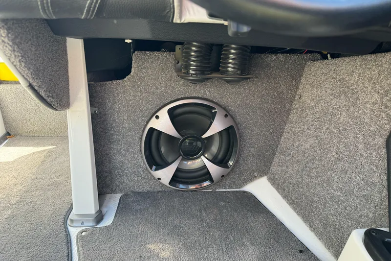 Slide: The Image of 2017 Malibu Wakesetter 23 LSV interior with speaker and carpeted flooring. - 21