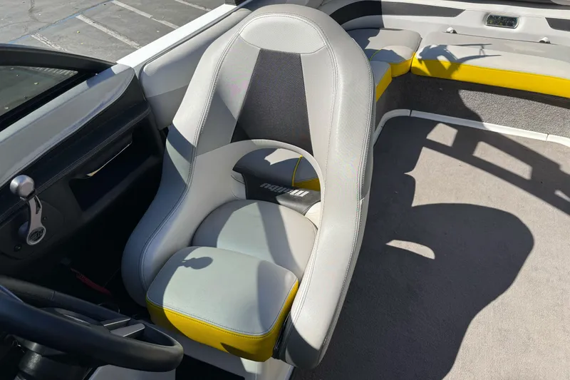Slide: The Image of 2017 Malibu Wakesetter 23 LSV interior with gray and yellow seating. - 24