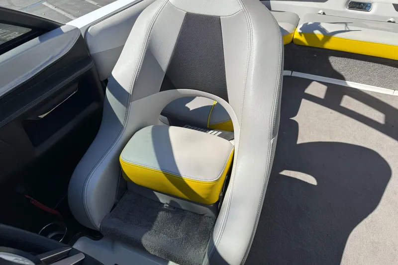 Slide: The Image of 2017 Malibu Wakesetter 23 LSV interior with gray and yellow seating. - 25