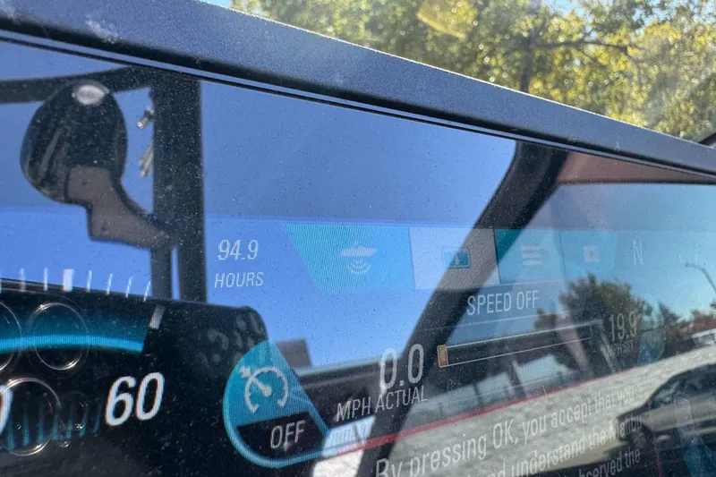 Slide: The Image of Dashboard of a 2017 Malibu Wakesetter 23 LSV showing 94.9 hours usage. - 36
