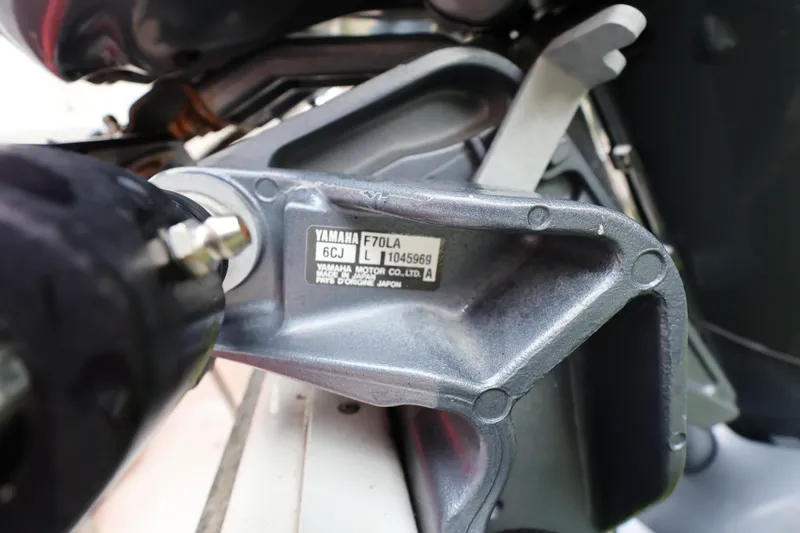 Slide: The Image of Close-up of Yamaha F70LA engine part on 2016 Robalo R160 Center Console boat. - 30
