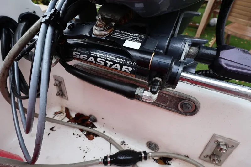 Slide: The Image of 2016 Robalo R160 Center Console boat with SeaStar steering cylinder. - 31