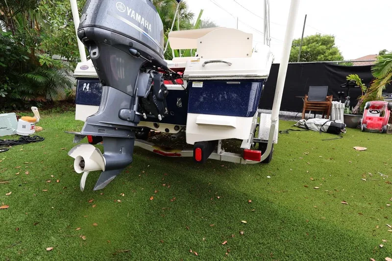 Slide: The Image of 2016 Robalo R160 Center Console boat with Yamaha outboard motor on grass. - 41