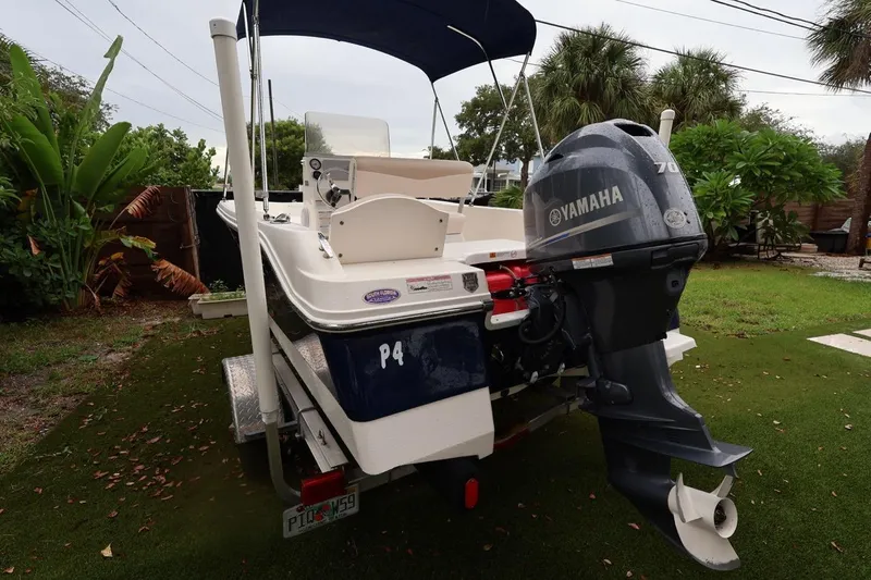 Slide: The Image of 2016 Robalo R160 Center Console boat with Yamaha engine on trailer. - 45