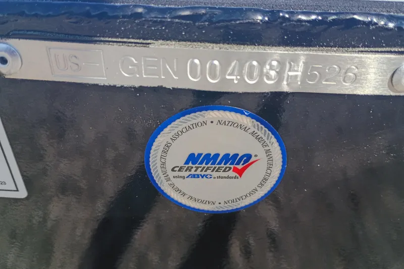 Slide: The Image of Boat hull identification number and NMMA certification sticker on a 2026 G3 1810SE model. - 14