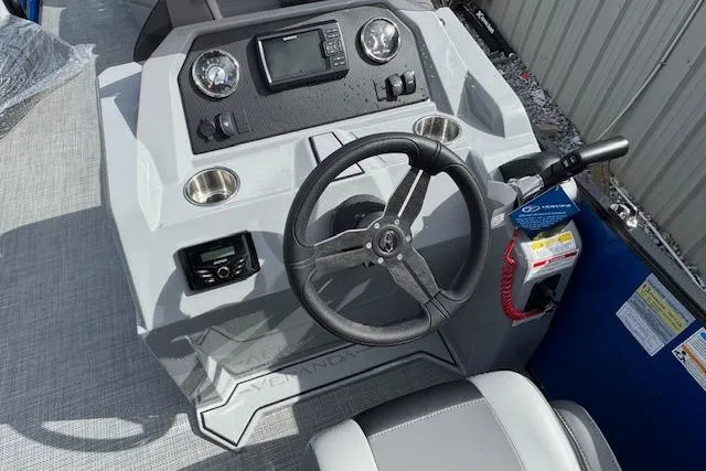 Slide: The Image of 2026 Veranda VV22RC boat dashboard with steering wheel and control panel. - 11