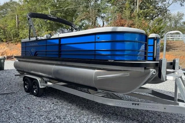 Slide: The Image of 2026 Veranda VV22RC pontoon boat on trailer, featuring sleek blue design and modern amenities. - 5