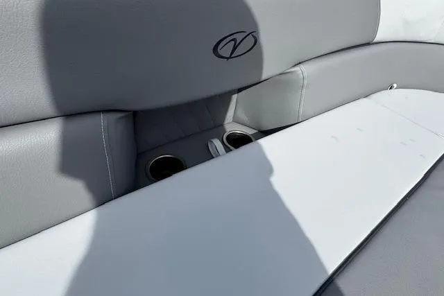 Slide: The Image of 2026 Veranda VV22RC boat interior with gray seating and cup holders. - 9