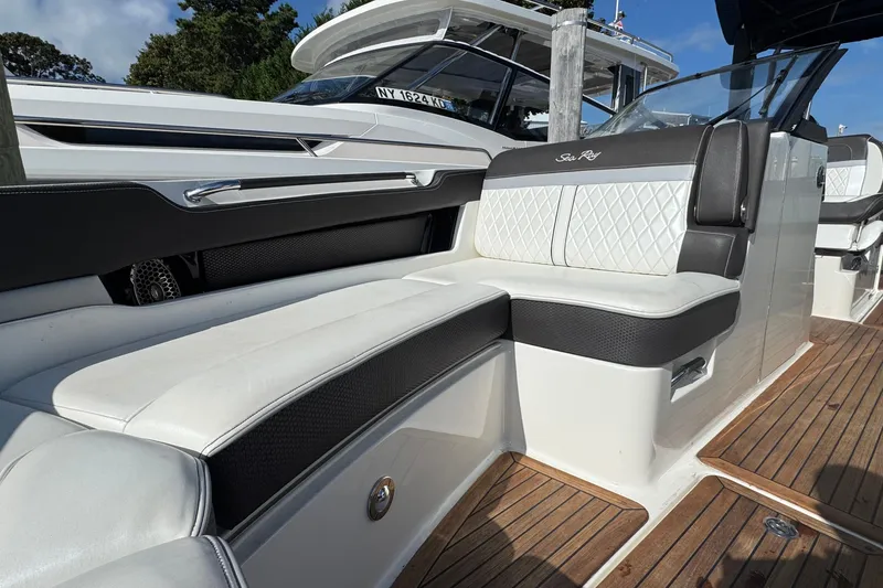 Slide: The Image of 2017 Sea Ray SLX 310 Outboard with luxurious seating and sleek design. - 30