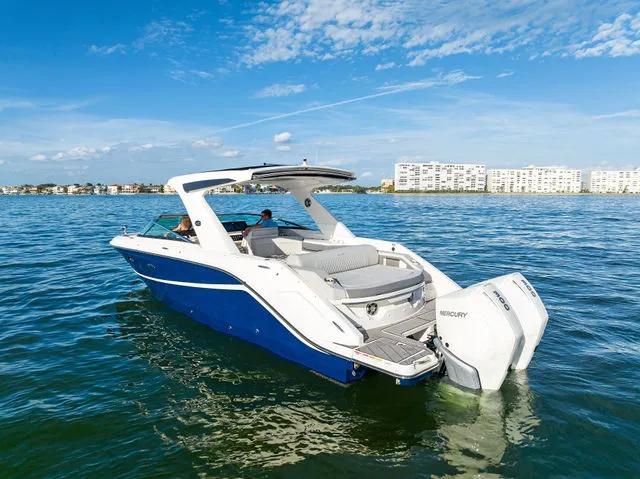 Slide: The Image of 2017 Sea Ray SLX 310 Outboard boat with spacious seating and teak flooring. - 41