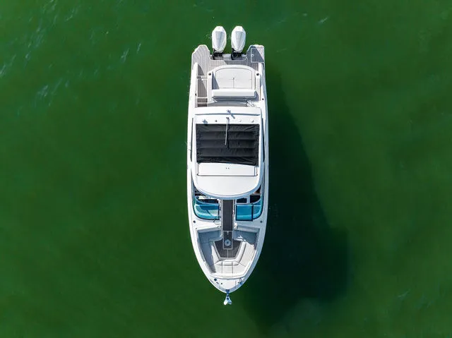 Slide: The Image of 2017 Sea Ray SLX 310 Outboard boat with spacious seating and sleek design. - 46