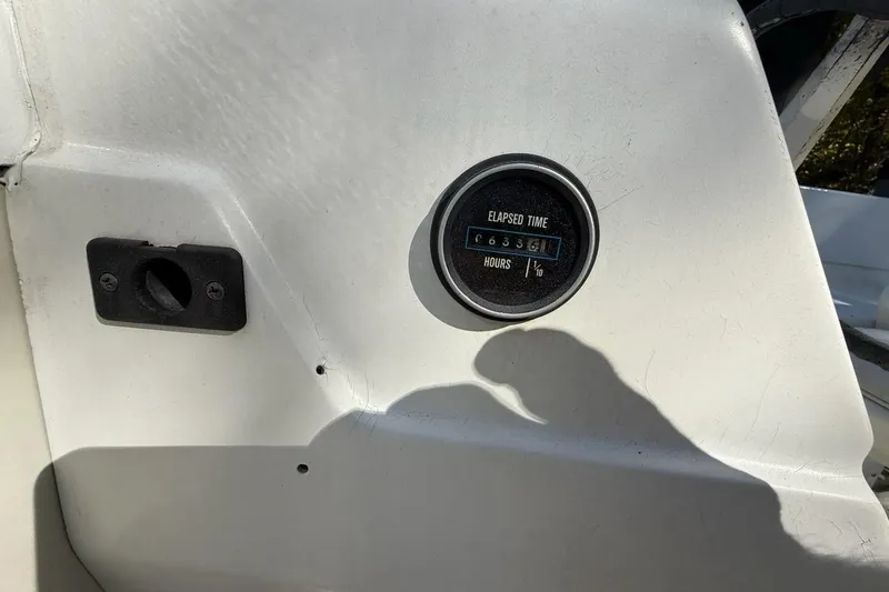 Slide: The Image of 1965 Bertram boat dashboard with elapsed time gauge showing 6336.1 hours. - 43