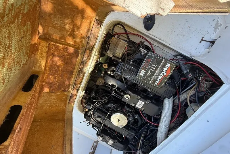 Slide: The Image of Engine compartment of a 1965 Bertram boat with MerCruiser 3.7L engine. - 50