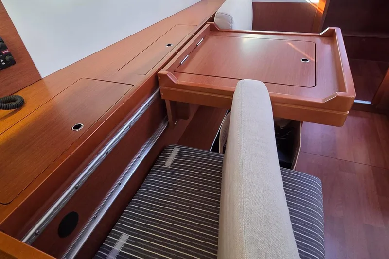 Slide: The Image of Adjustable Port-side Seating & Nav Table - 11