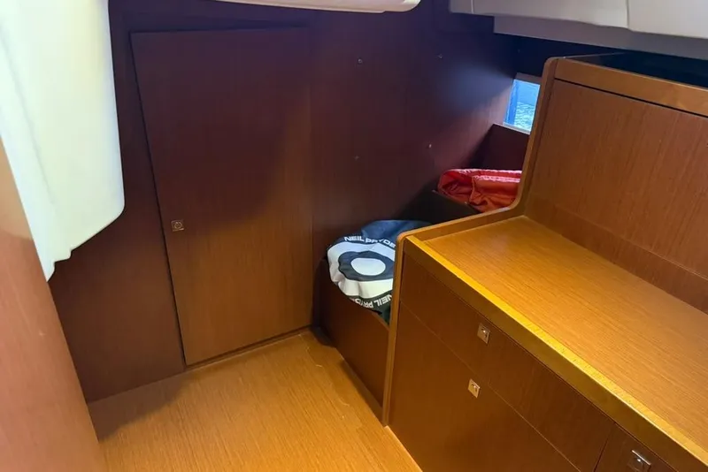 Slide: The Image of Interior cabin of 2014 Beneteau Oceanis 41 sailboat with wooden finish. - 14