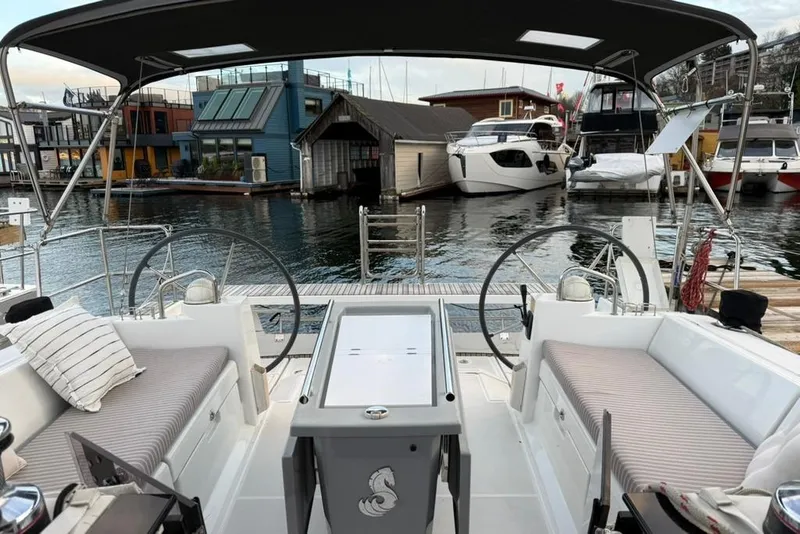 Slide: The Image of Cockpit view of 2014 Beneteau Oceanis 41 yacht docked at marina. - 24