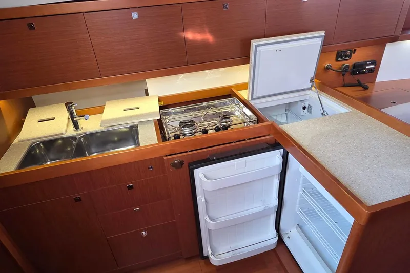 Slide: The Image of Galley with Double Sinks, Stove/Oven, Fridge, and Freezer - 3