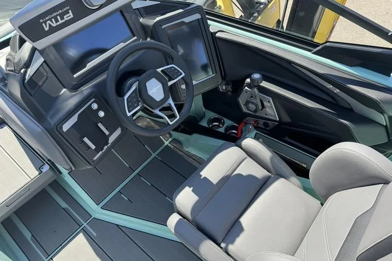 Slide: The Image of 2024 Supra SE 575 boat interior with modern dashboard and steering wheel. - 10