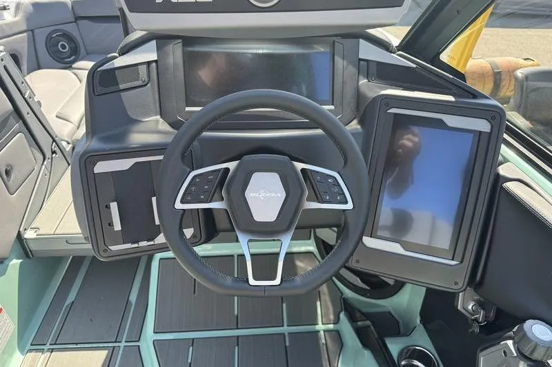 Slide: The Image of 2024 Supra SE 575 dashboard with modern steering wheel and digital displays. - 12