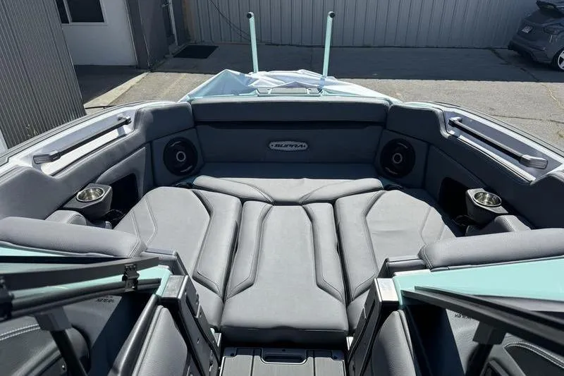 Slide: The Image of 2024 Supra SE 575 boat interior with luxurious seating and modern design. - 6