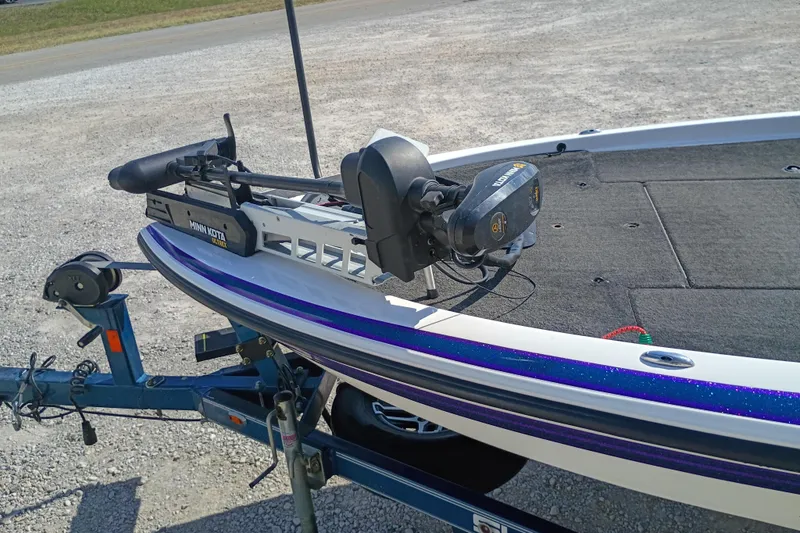 Slide: The Image of 2003 Skeeter TZX190 boat with Minn Kota trolling motor on trailer. - 5