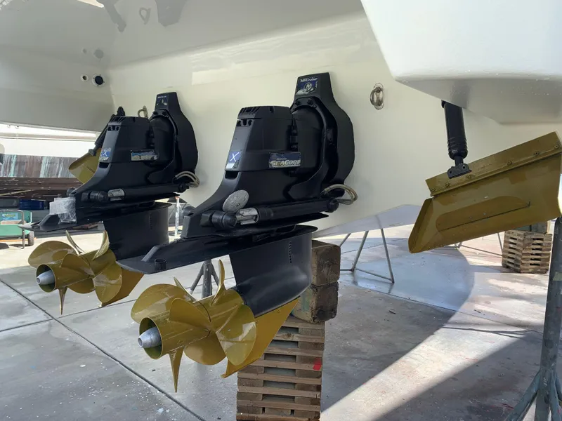 Slide: The Image of 2012 Formula 350 Sun Sport boat with dual propellers and outdrives on display. - 2