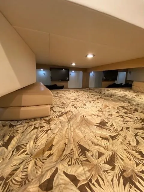 Slide: The Image of Interior cabin of 2012 Formula 350 Sun Sport with patterned bedding and ambient lighting. - 20