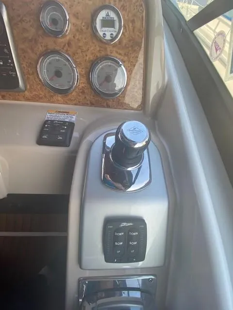 Slide: The Image of Control panel of a 2012 Formula 350 Sun Sport boat with gauges and switches. - 8