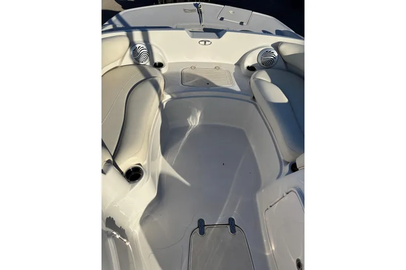 Slide: The Image of 2014 Tahoe 215 Xi boat interior with seating and speakers. - 9