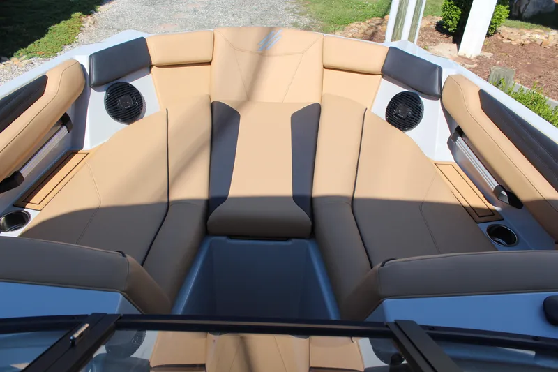 Slide: The Image of 2026 ATX Surf Boats 22 Type-S interior with tan seating and built-in speakers. - 10