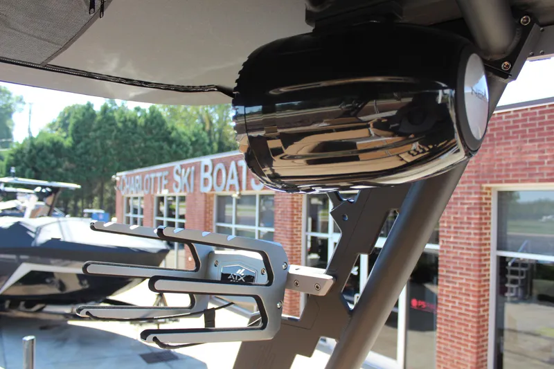 Slide: The Image of 2026 ATX Surf Boats 22 Type-S with speaker and wakeboard rack at Charlotte Ski Boats. - 15