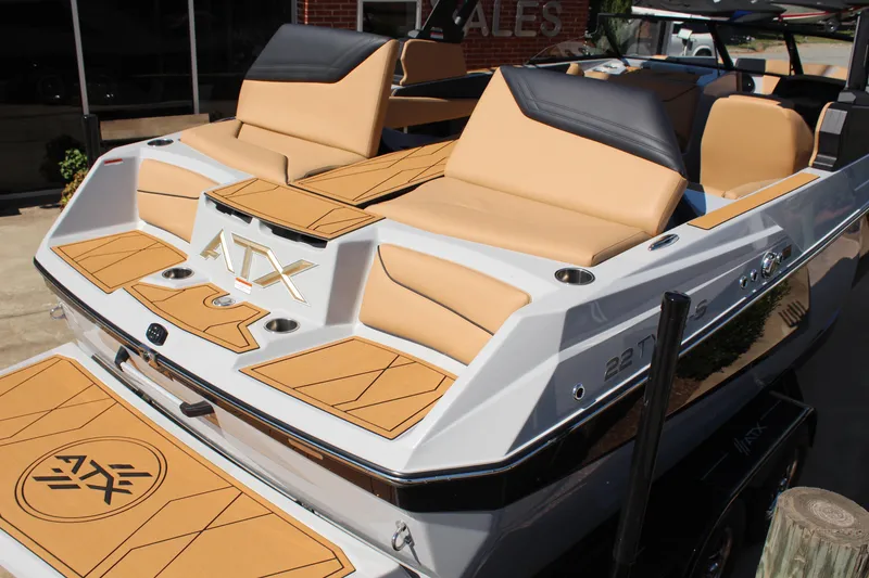 Slide: The Image of 2026 ATX Surf Boats 22 Type-S with tan seating and sleek design. - 7