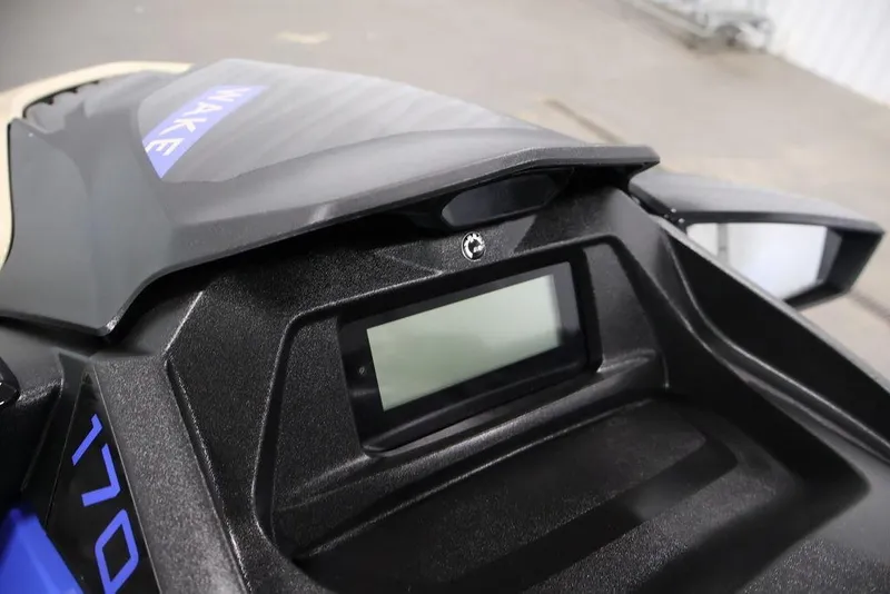Slide: The Image of 2026 Sea-Doo Wake 170 dashboard close-up, featuring sleek design and digital display. - 11