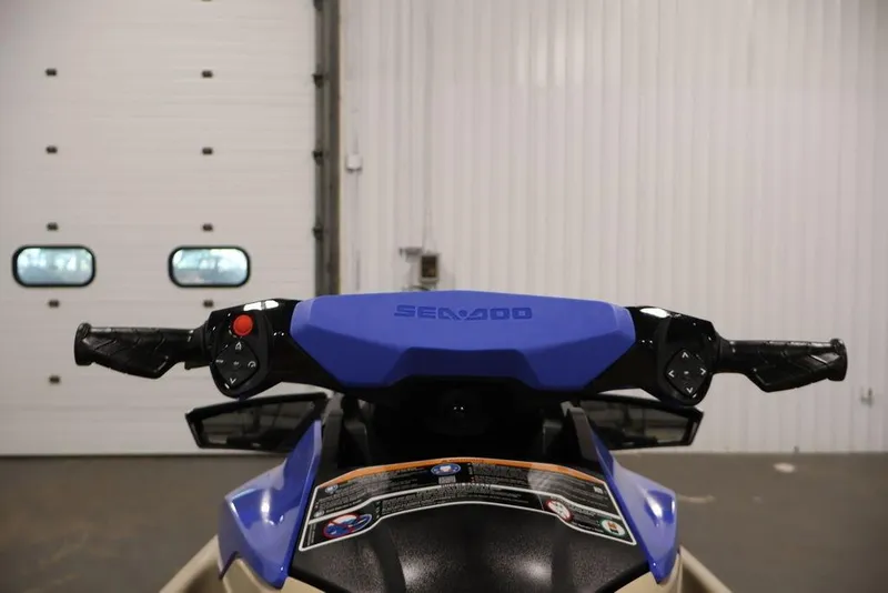 Slide: The Image of 2026 Sea-Doo Wake 170 handlebars in a garage setting, showcasing controls and design. - 21