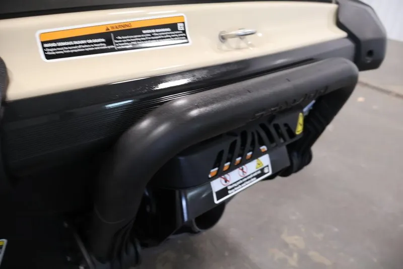 Slide: The Image of 2026 Sea-Doo Wake 170 rear view with warning labels and handle detail. - 22