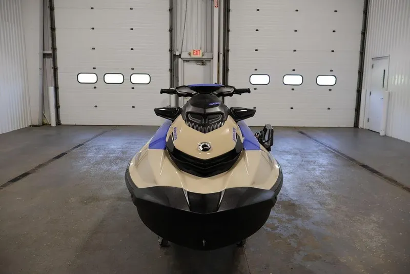 Slide: The Image of 2026 Sea-Doo Wake 170 jet ski in a garage, front view. - 4