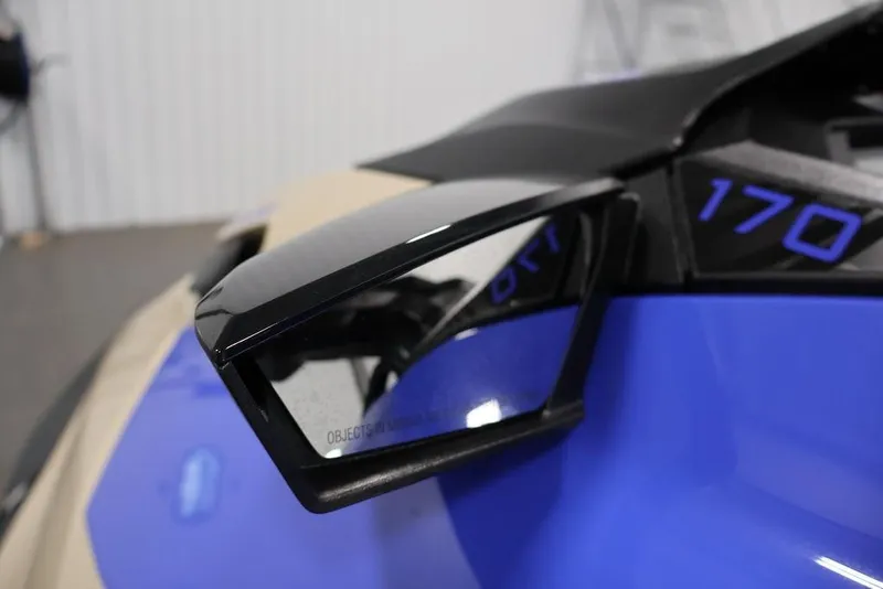 Slide: The Image of 2026 Sea-Doo Wake 170 close-up, showcasing sleek design and vibrant blue detailing. - 9