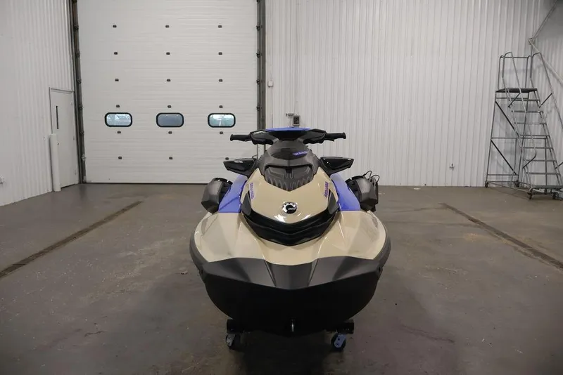 Slide: The Image of 2026 Sea-Doo Wake 170 jet ski in a spacious indoor garage setting. - 4