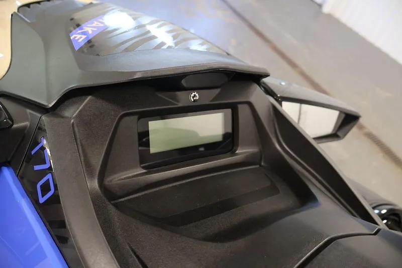 Slide: The Image of 2026 Sea-Doo Wake 170 dashboard close-up, featuring sleek design and digital display. - 14
