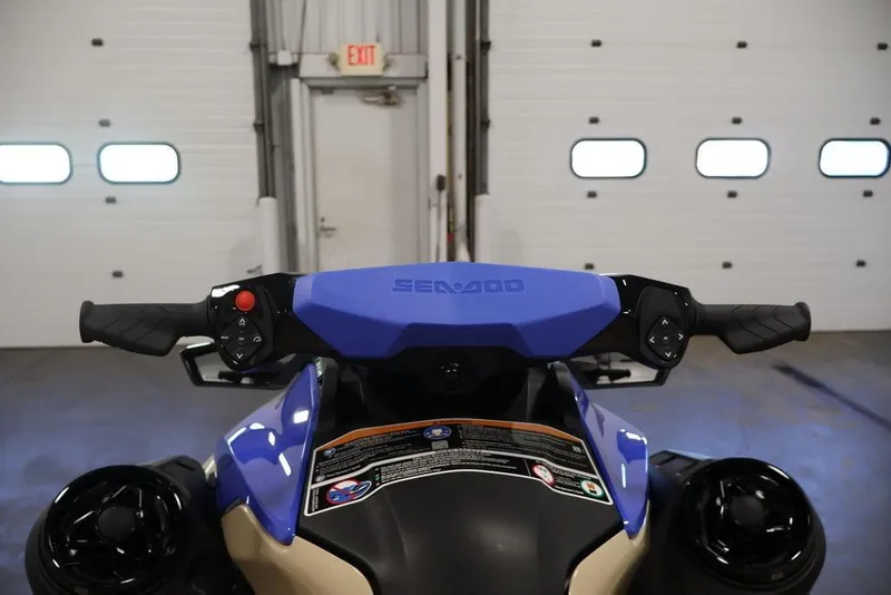 Slide: The Image of 2026 Sea-Doo Wake 170 handlebars in a garage setting. - 16
