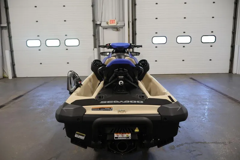 Slide: The Image of 2026 Sea-Doo Wake 170 jet ski in a garage, rear view. - 18